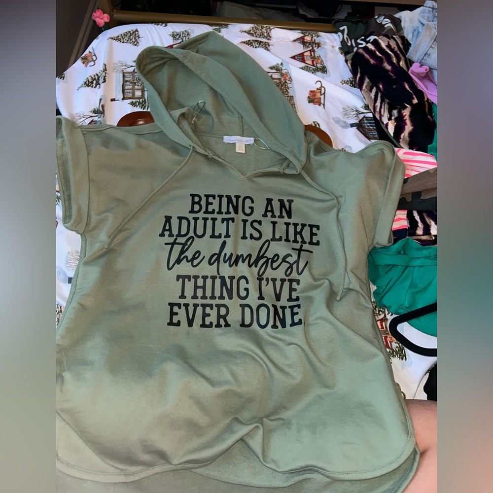Green sweater that I love but I just can’t fit.